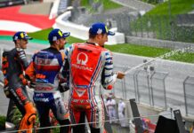 Espargaró y Oliveira junto a Miller en el podio