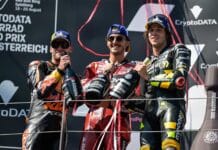 Binder y Bezzecchi junto a Bagnaia en el podio